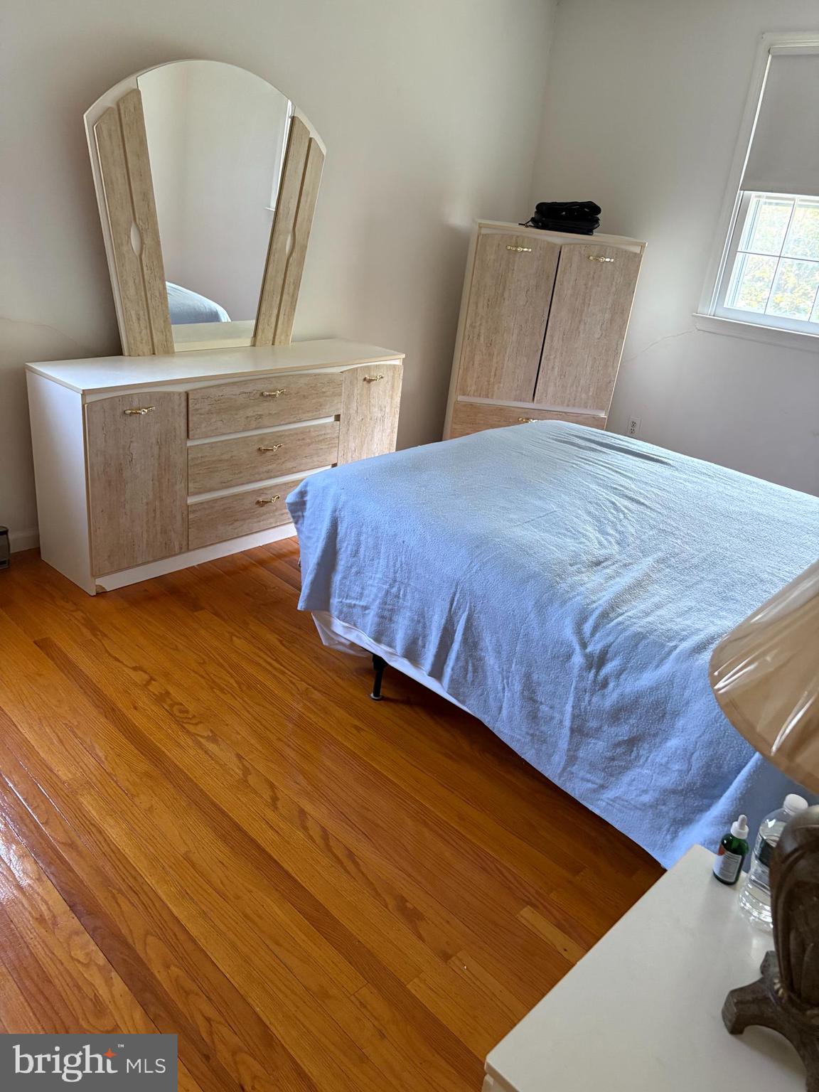 658 West Rolling Road Springfield, PA 19064 - Photo 13 of 15 a bedroom with a bed and window