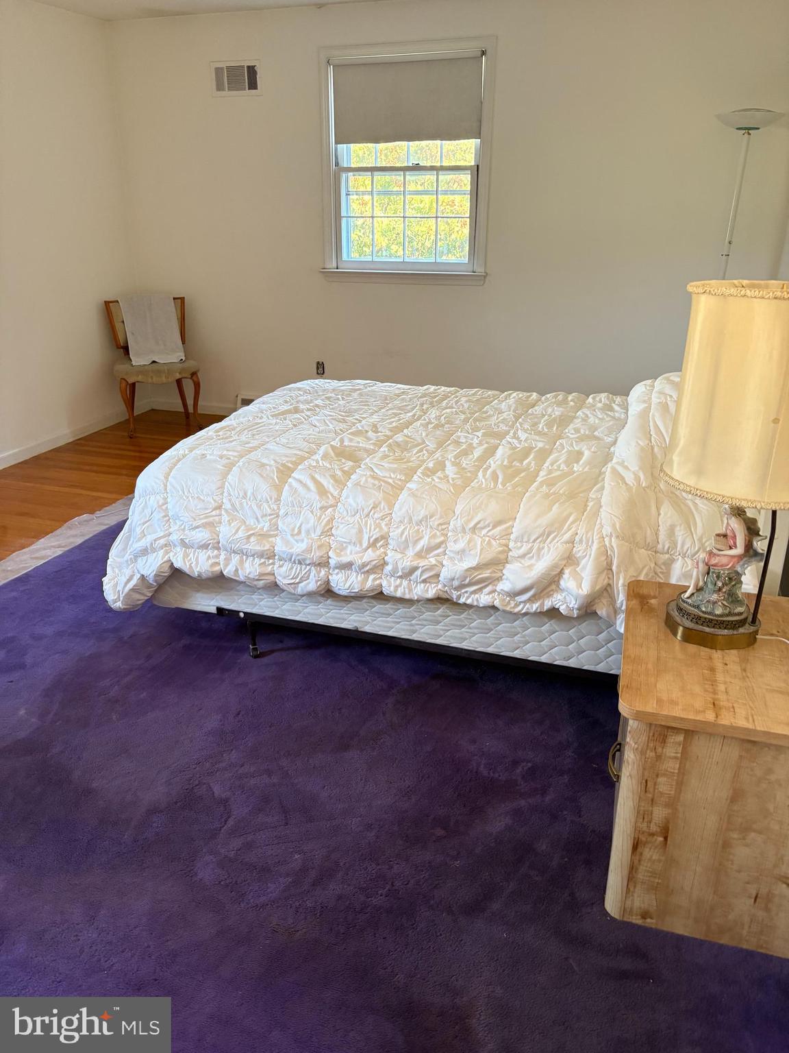 658 West Rolling Road Springfield, PA 19064 - Photo 15 of 15 a bed sitting in a bedroom next to a window