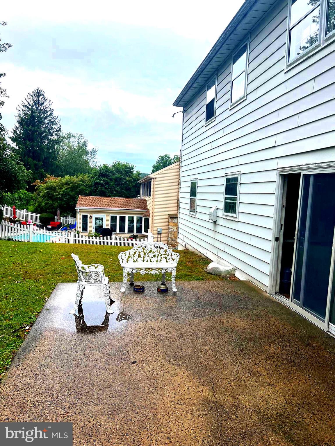 658 West Rolling Road Springfield, PA 19064 - Photo 5 of 15 a view of two chairs in the backyard
