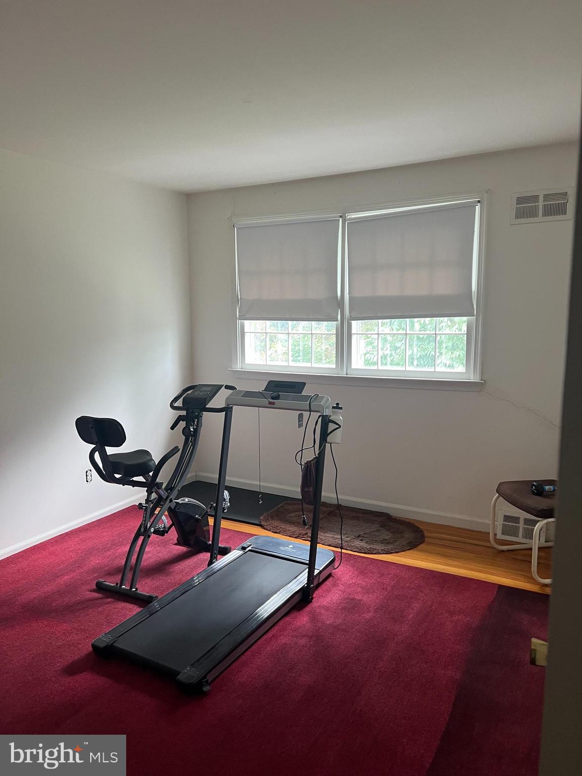 658 West Rolling Road Springfield, PA 19064 - Photo 9 of 15 a room with gym equipment and a window