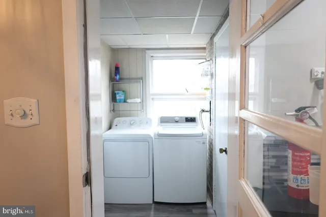 a view of a bathroom from a hallway