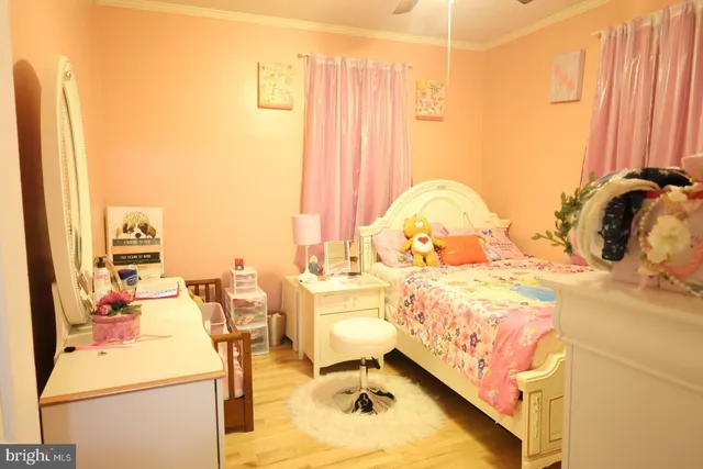 a view of walk in closet with bathroom and shower