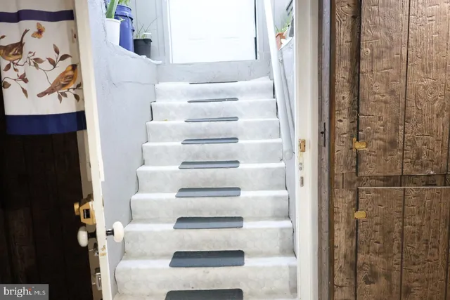 a dinning table and chairs in a room