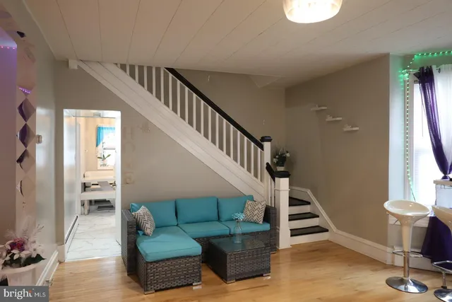 a view of entryway with wooden floor