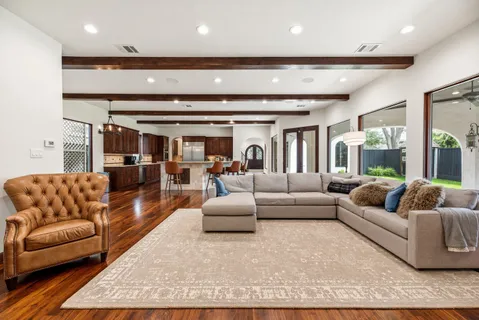 a living room with furniture and a couch