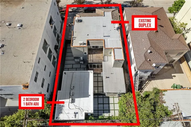 a view of path along with retail shop and buildings