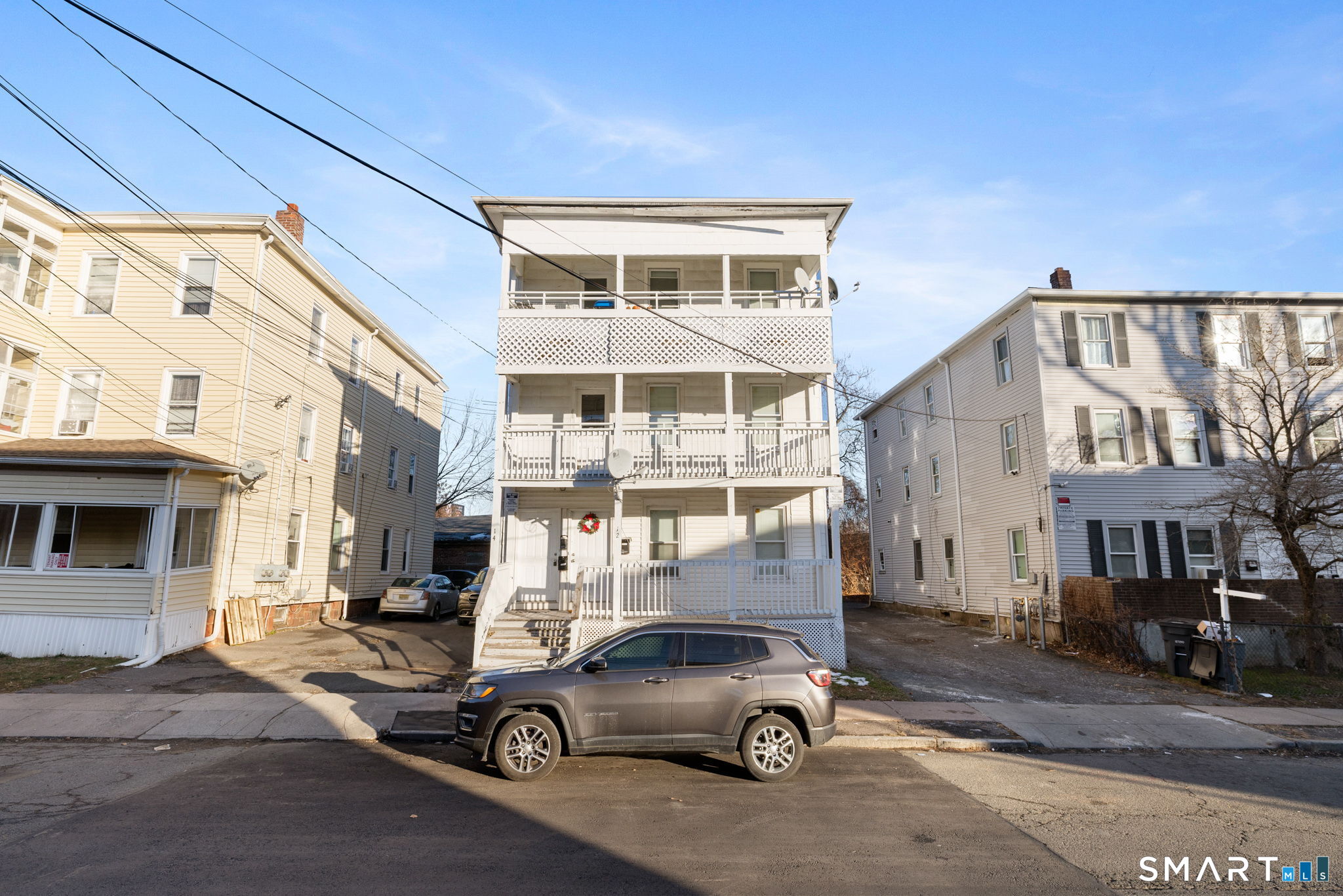 a car parked in front of a building