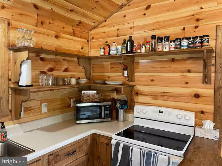 184 Skiles- Pitsenbarger Road Franklin, WV 26807 - Photo 15 of 39 Rustic kitchen with warm wood accents.