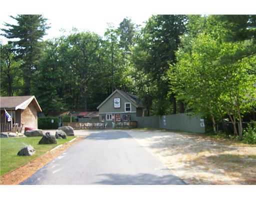 46 Sebago Road Sebago, ME 04029 - Photo 4 of 15 Exterior Front. Circular Drive
