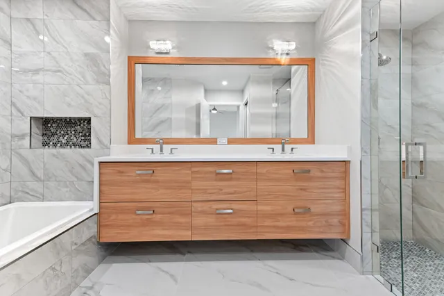 a bathroom with a sink and a mirror