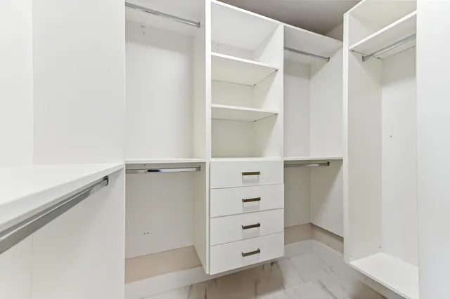 a view of a bench in front of a building