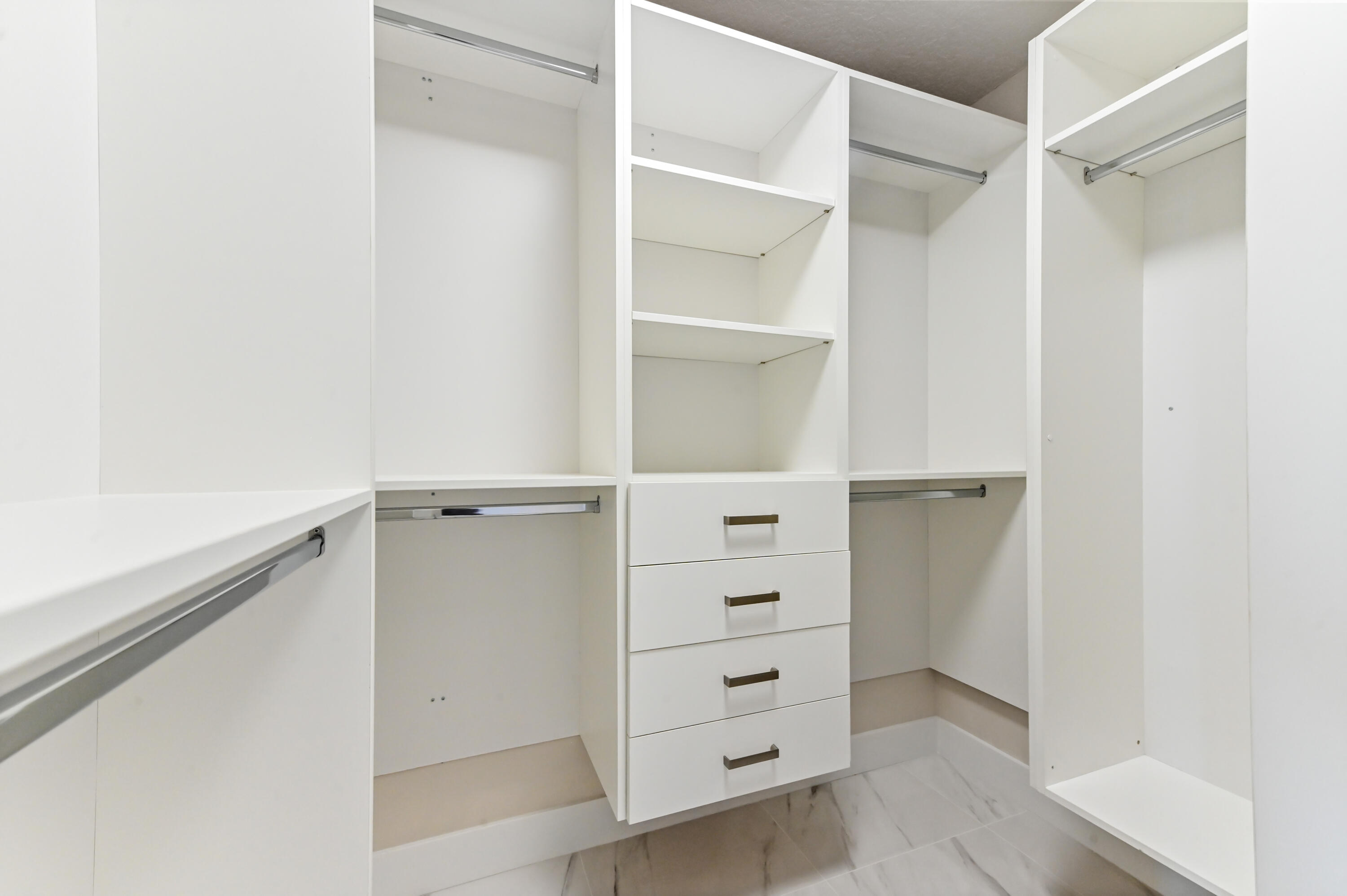 12510 Crystal Pointe Drive, Unit 102 Boynton Beach, FL 33437 - Photo 23 of 27 a view of walk in closet