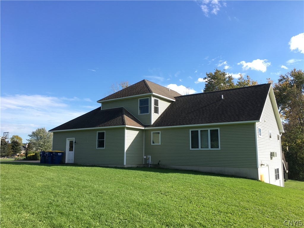 5479 Lake Road Tully, NY 13159 - Photo 2 of 41 Man door into the garage and side of the home. Loo