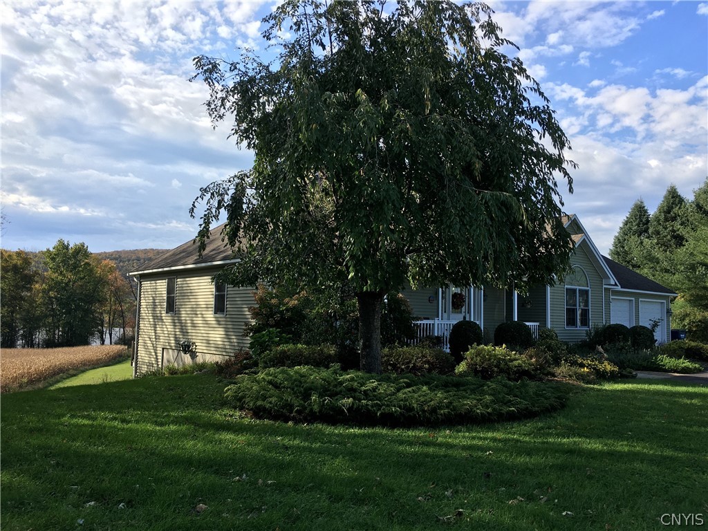 5479 Lake Road Tully, NY 13159 - Photo 3 of 41 Side of the home with meticulously maintained lawn