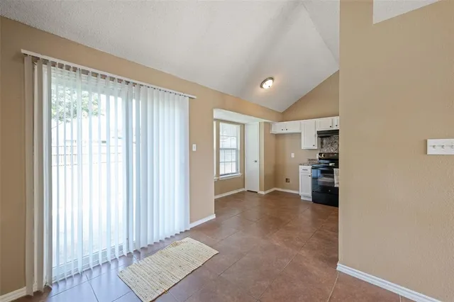 a view of workspace with furniture and window
