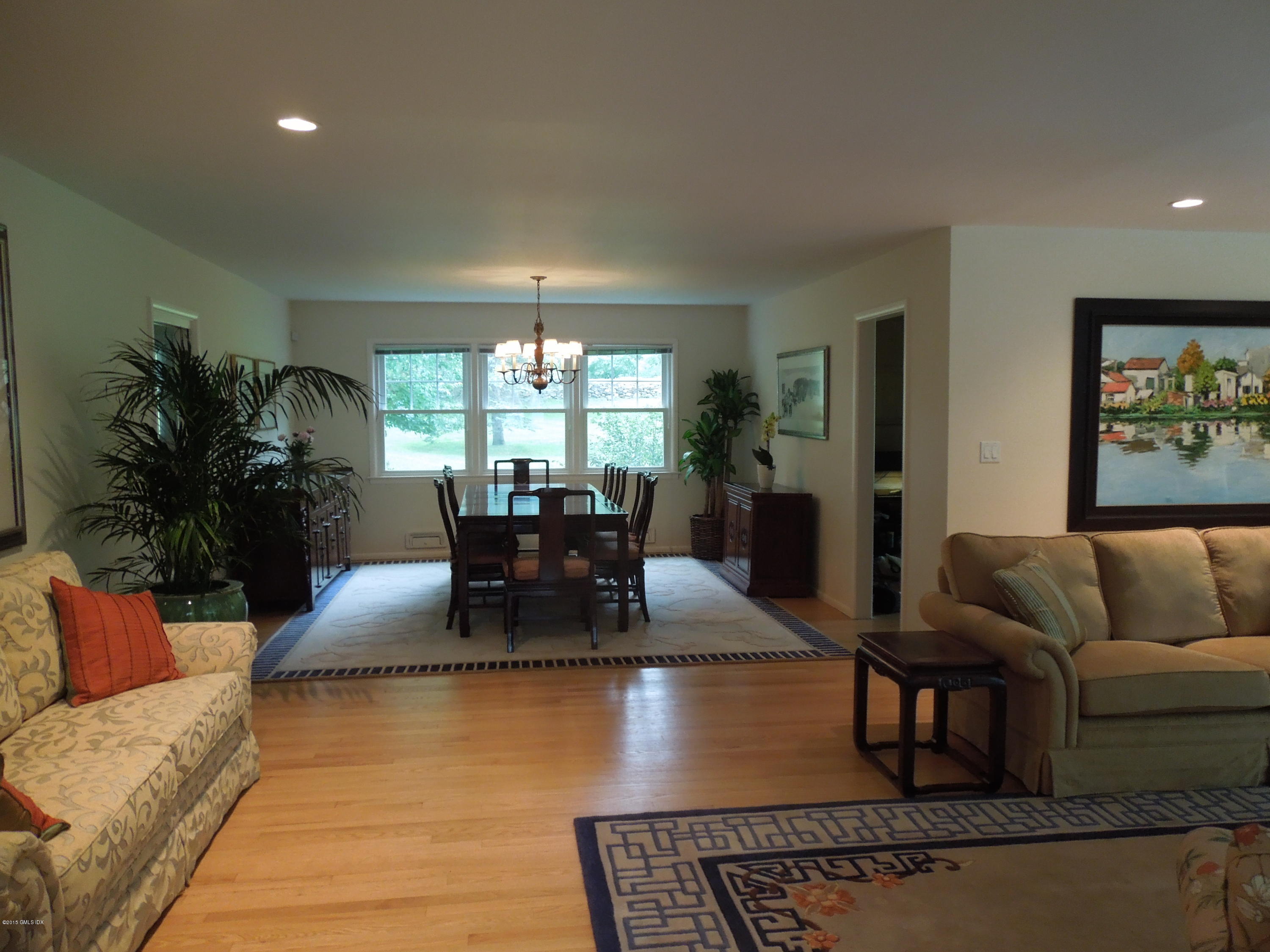 408 Taconic Road Greenwich, CT 06831 - Photo 5 of 18 a living room with furniture and a couch