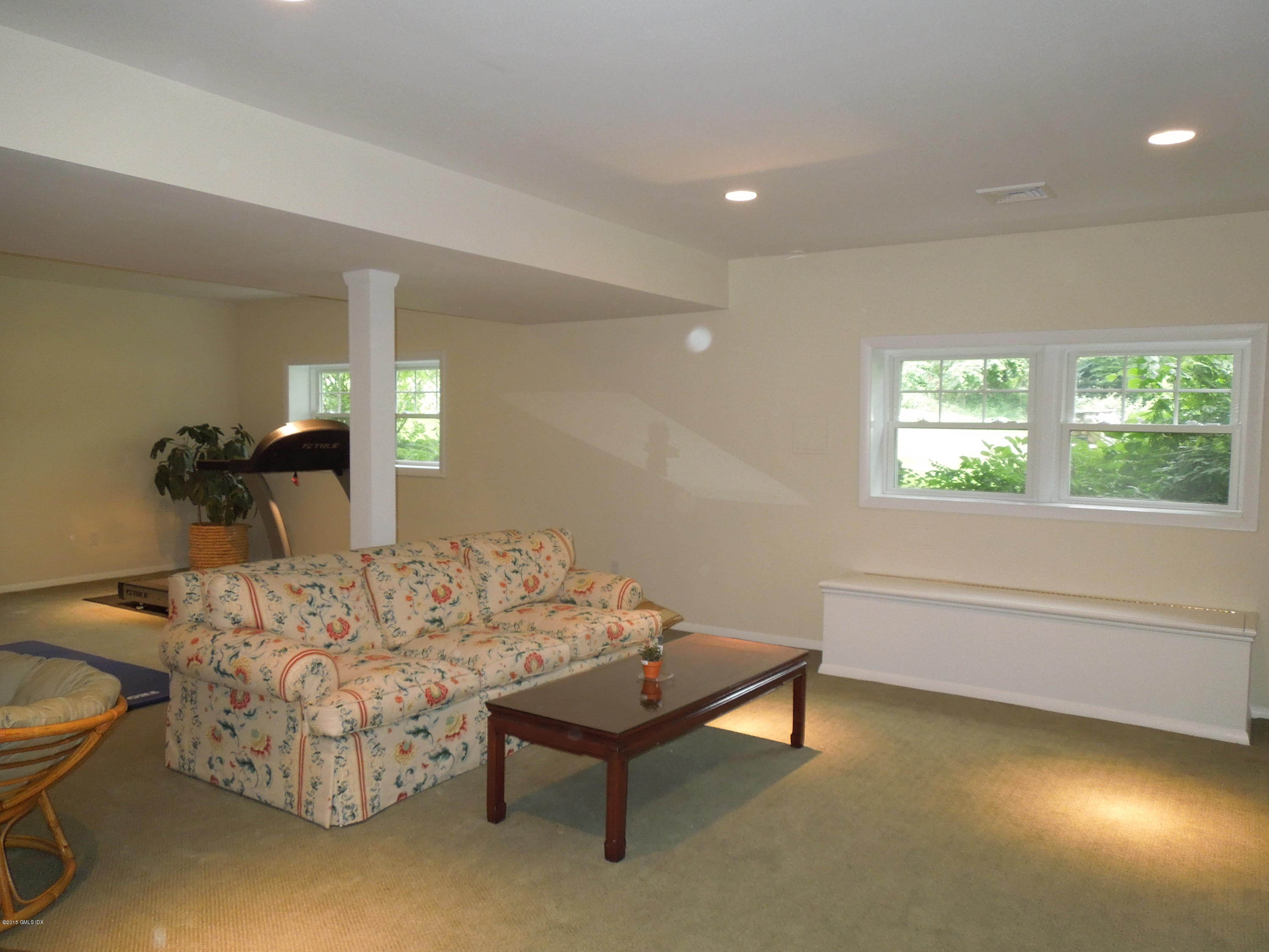 408 Taconic Road Greenwich, CT 06831 - Photo 8 of 18 a living room with furniture and a wooden floor