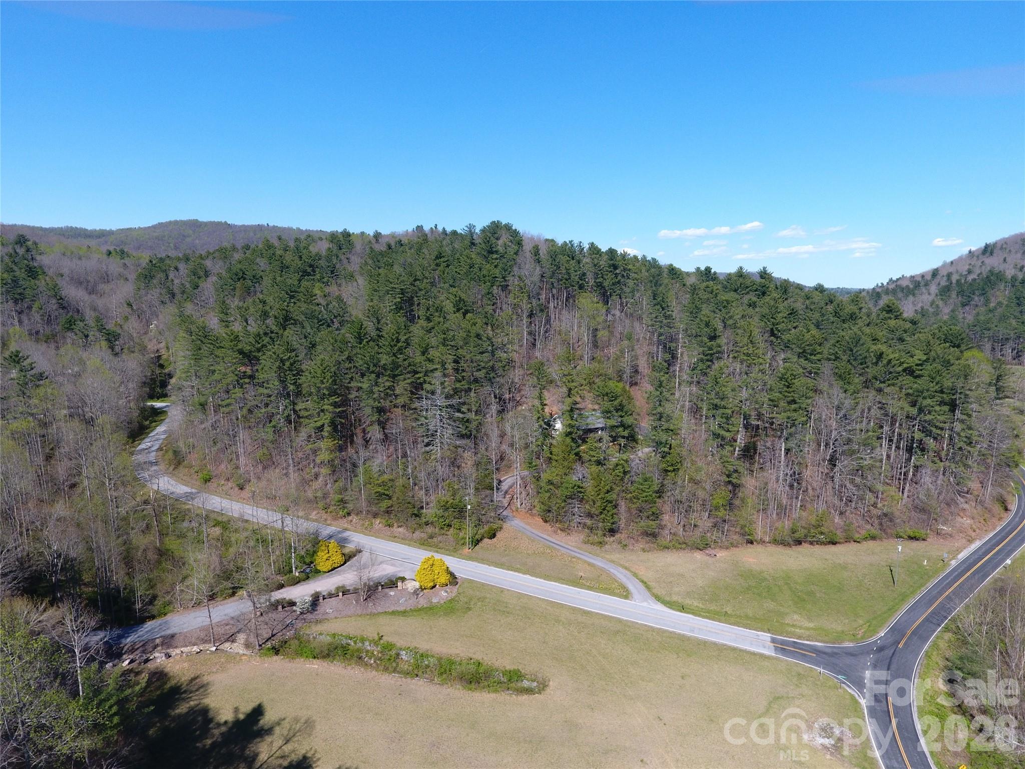 0 Rock Creek Road Zirconia, NC 28790 - Photo 5 of 11 a view of a back yard from a balcony