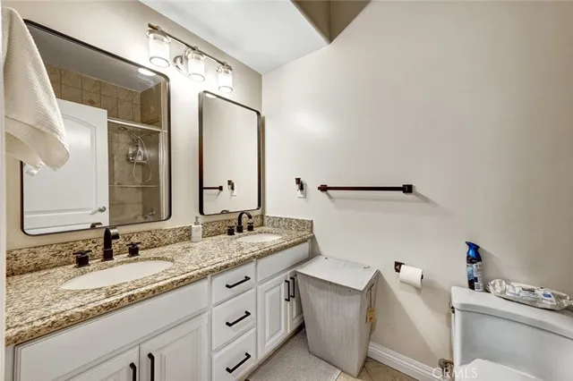 a view of a room with wooden floor and a window