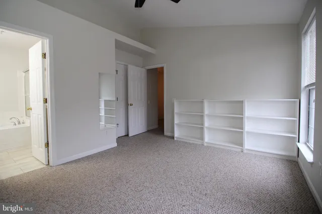 a view of room with walk in closet