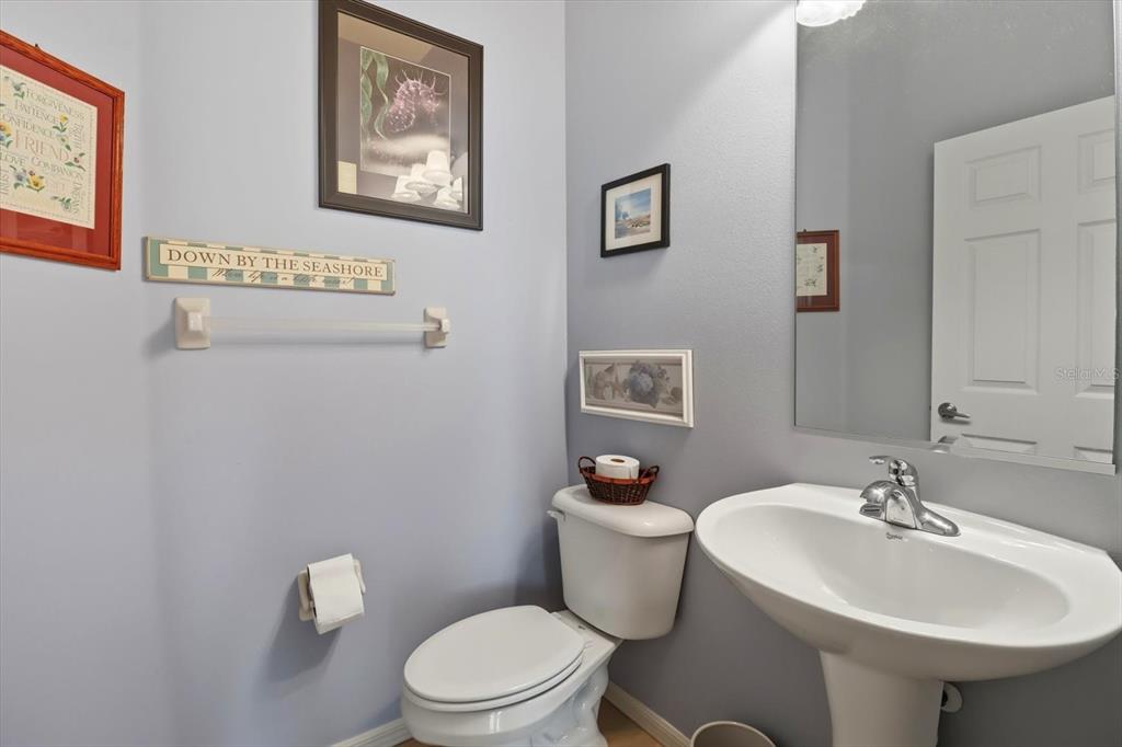 366 West Doerr Path Hernando, FL 34442 - Photo 25 of 47 a white toilet sitting next to a bathroom sink