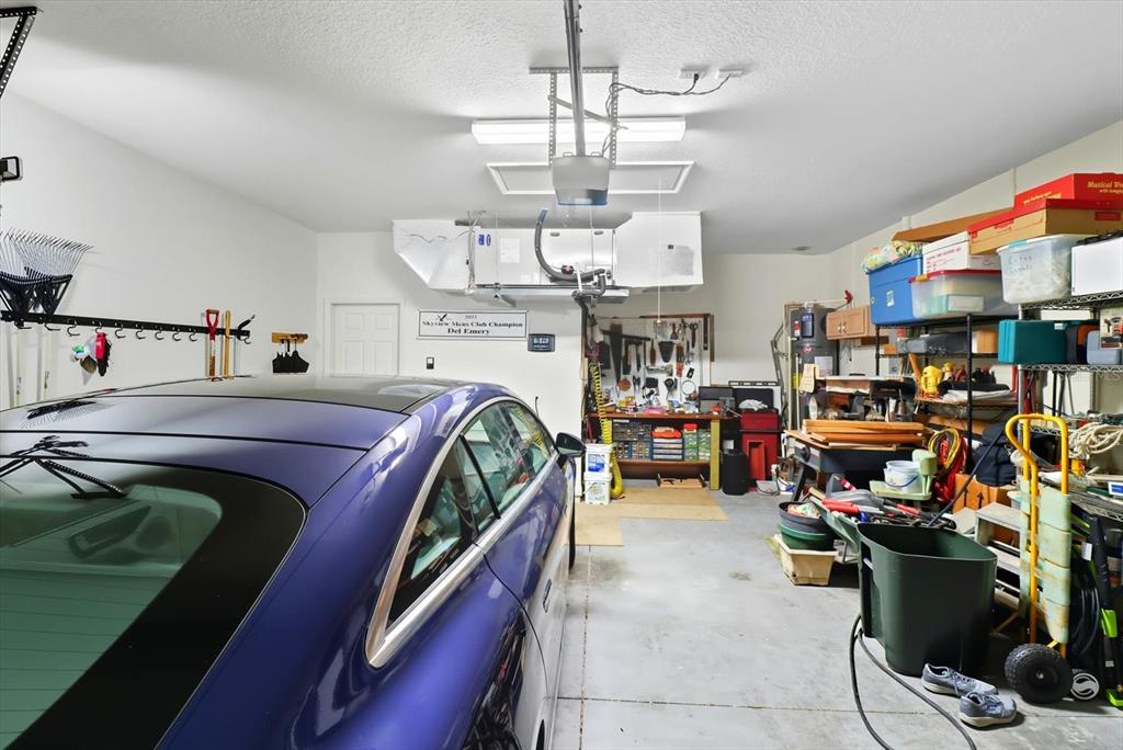 366 West Doerr Path Hernando, FL 34442 - Photo 33 of 47 a living room filled with furniture and a chandelier