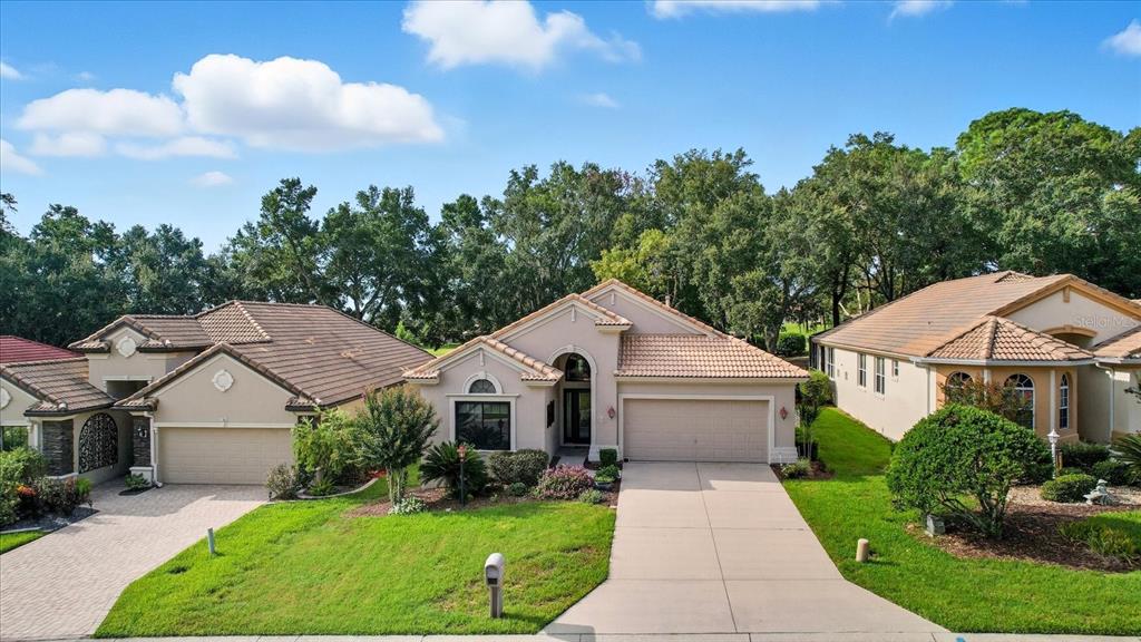 366 West Doerr Path Hernando, FL 34442 - Photo 41 of 47 an aerial view of a house with yard and green space