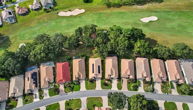 an aerial view of a house with a garden