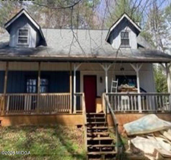 446 Silver Fox Trail Cleveland, GA 30528 - Photo 1 of 1 a view of house with a yard from a balcony