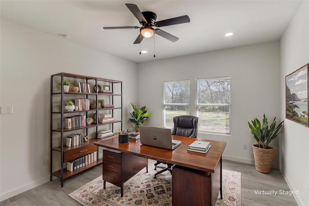 3108 Delafield Lane Dallas, TX 75227 - Photo 25 of 30 a view of a workspace with furniture and a potted plant