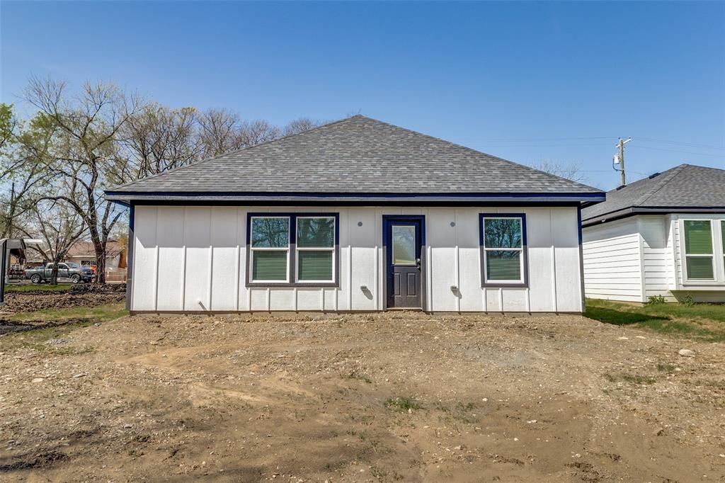 3108 Delafield Lane Dallas, TX 75227 - Photo 27 of 30 a front view of a house with a garden