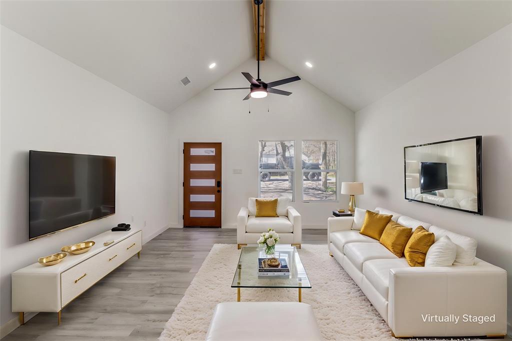 3108 Delafield Lane Dallas, TX 75227 - Photo 3 of 30 a living room with furniture and a flat screen tv
