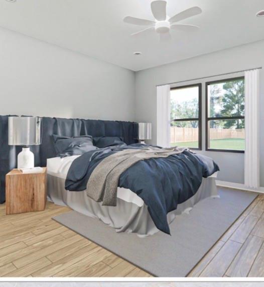 3108 Delafield Lane Dallas, TX 75227 - Photo 6 of 7 a bedroom with a bed and a large window