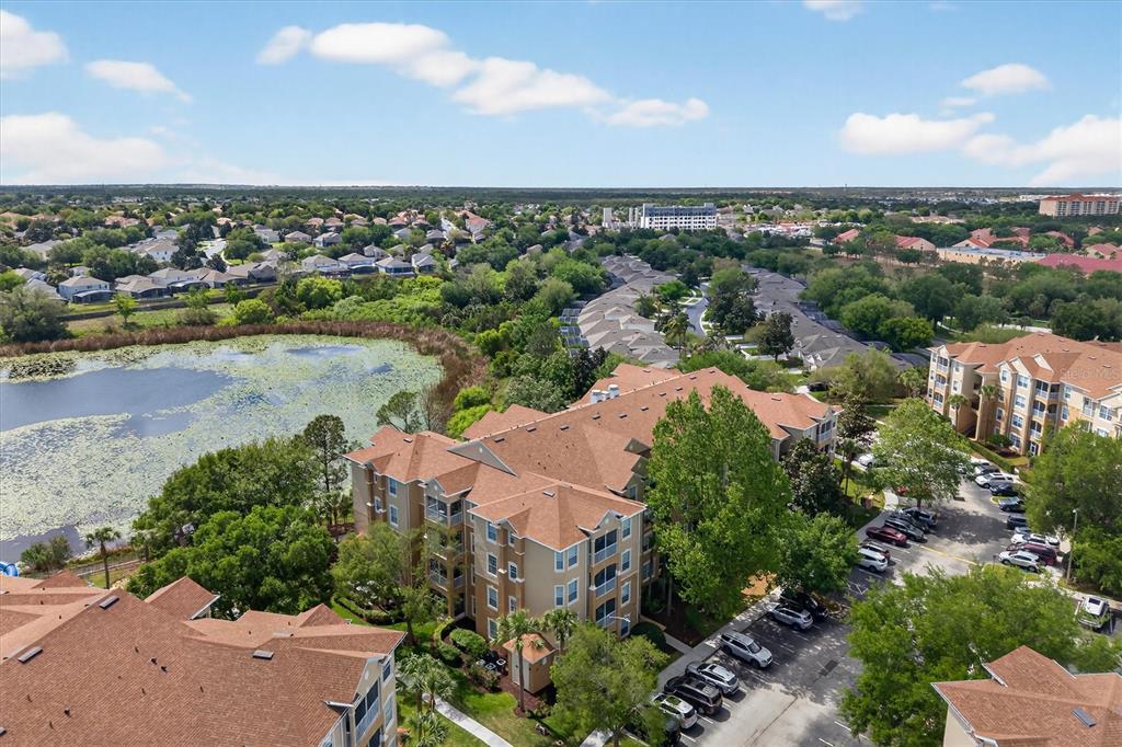 7664 Comrow Street, Unit 304 Kissimmee, FL 34747 - Photo 2 of 42 an aerial view of a city and lake view