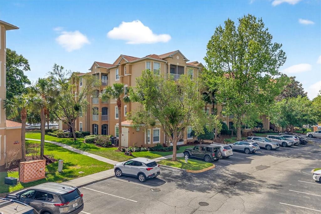 7664 Comrow Street, Unit 304 Kissimmee, FL 34747 - Photo 38 of 42 a view of a chair and table in backyard of the house