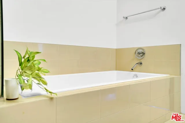 a bath tub sitting in a bathroom