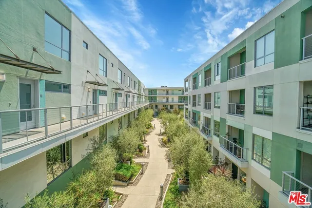 a view of a building from a balcony
