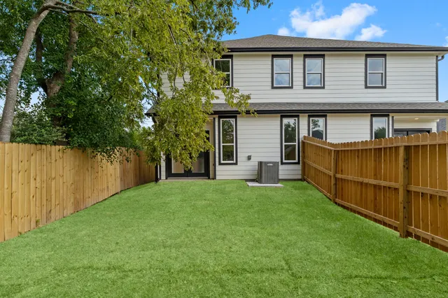 a view of backyard with green space
