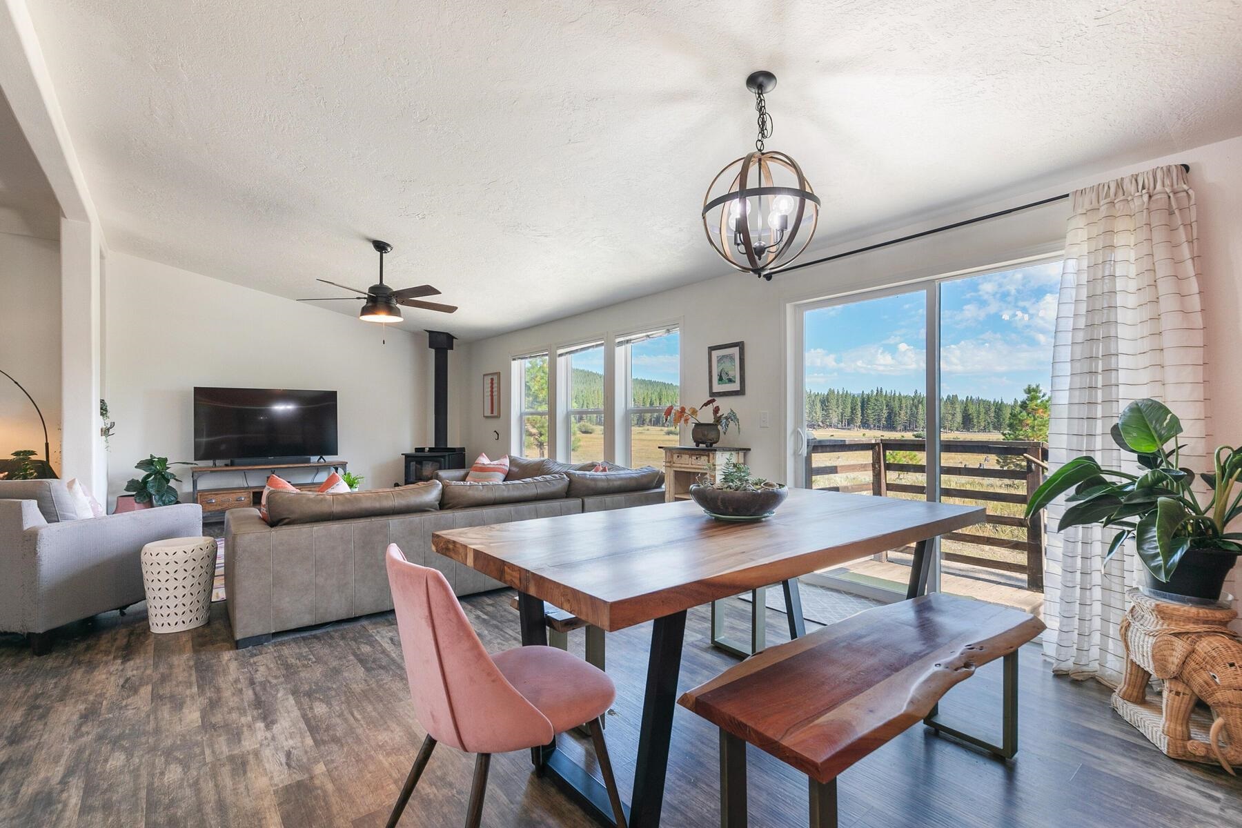 1015 Mountain Quail Road Calpine, CA 96124 - Photo 12 of 24 a view of a livingroom with furniture window and wooden floor