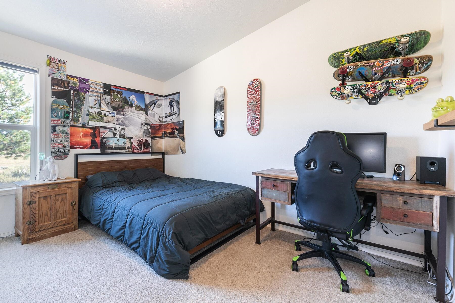 1015 Mountain Quail Road Calpine, CA 96124 - Photo 13 of 24 a bedroom with a workspace