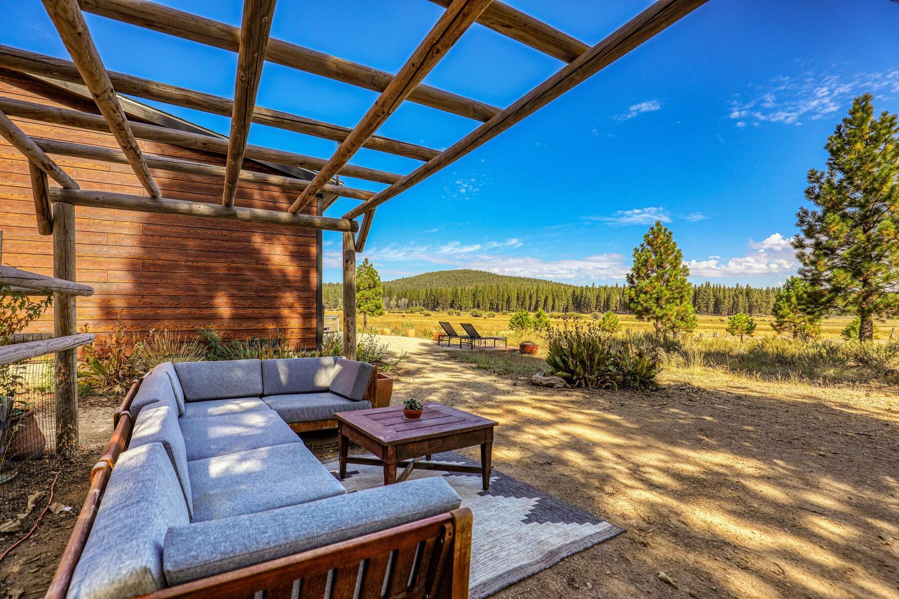 1015 Mountain Quail Road Calpine, CA 96124 - Photo 22 of 24 a view of a terrace with wooden floor