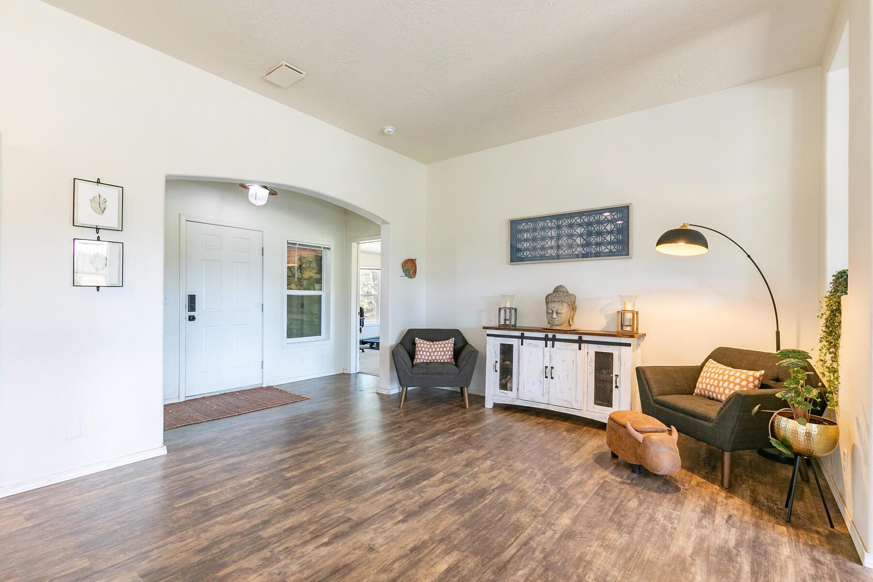 1015 Mountain Quail Road Calpine, CA 96124 - Photo 23 of 24 a view of living room with furniture and wooden floor