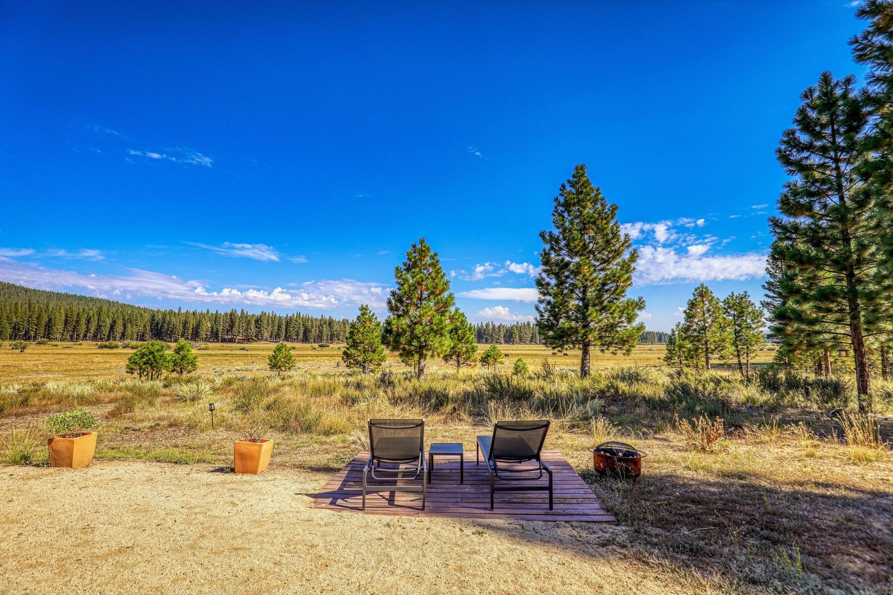 1015 Mountain Quail Road Calpine, CA 96124 - Photo 4 of 24 a view of swimming pool with outdoor seating