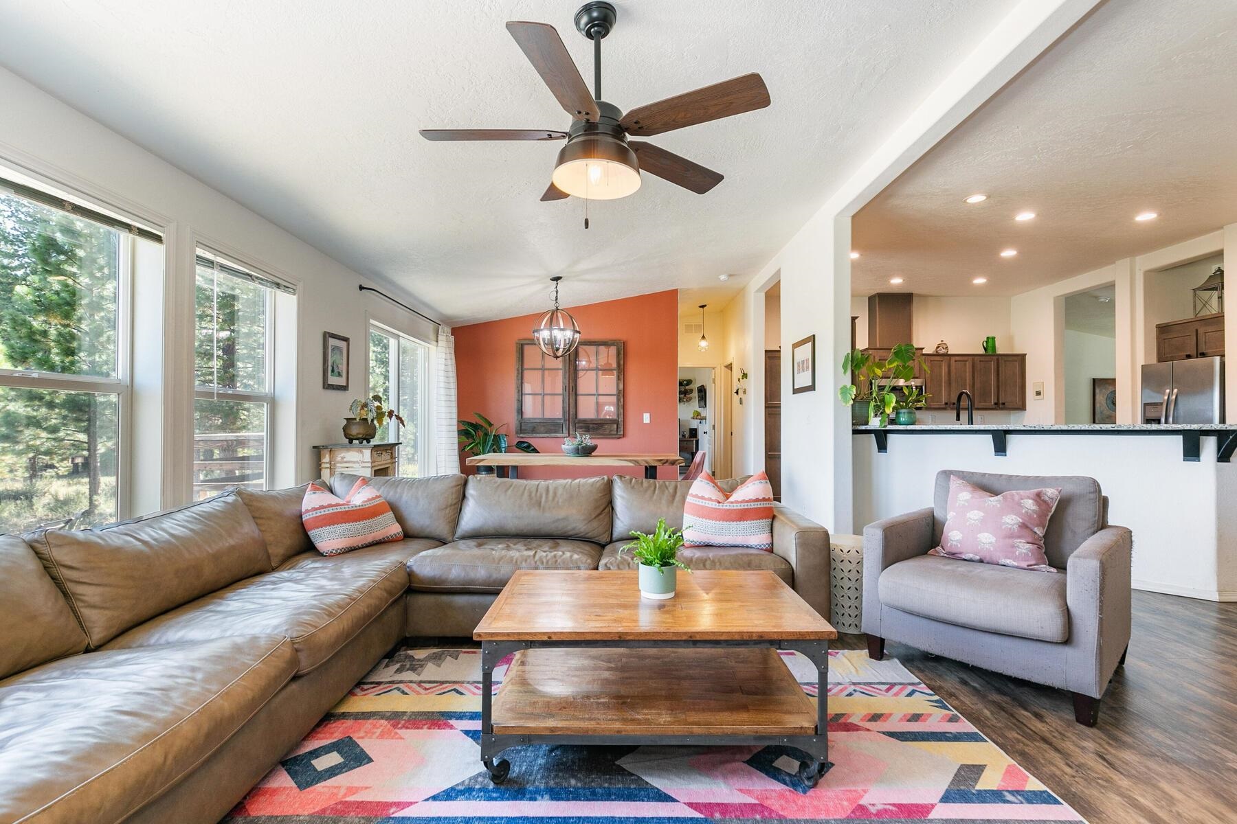 1015 Mountain Quail Road Calpine, CA 96124 - Photo 9 of 24 a living room with furniture and a large window