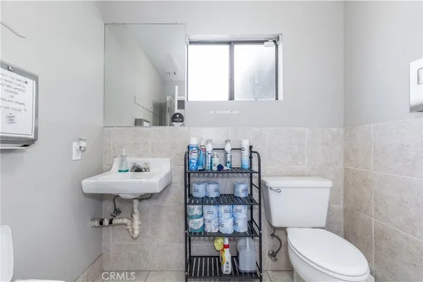 a dining room with furniture garden view and a chandelier