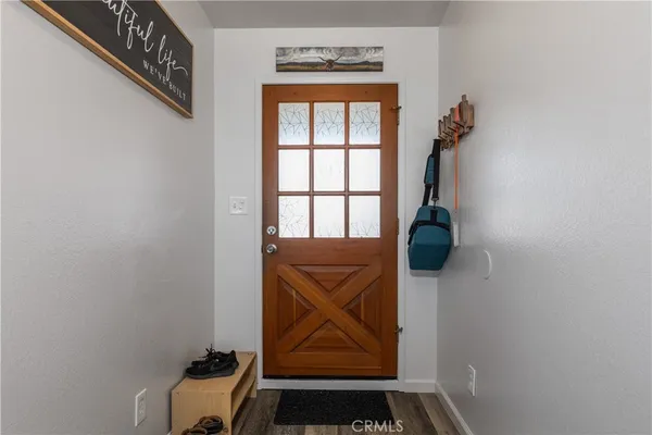 a kitchen with stainless steel appliances granite countertop a stove and a microwave