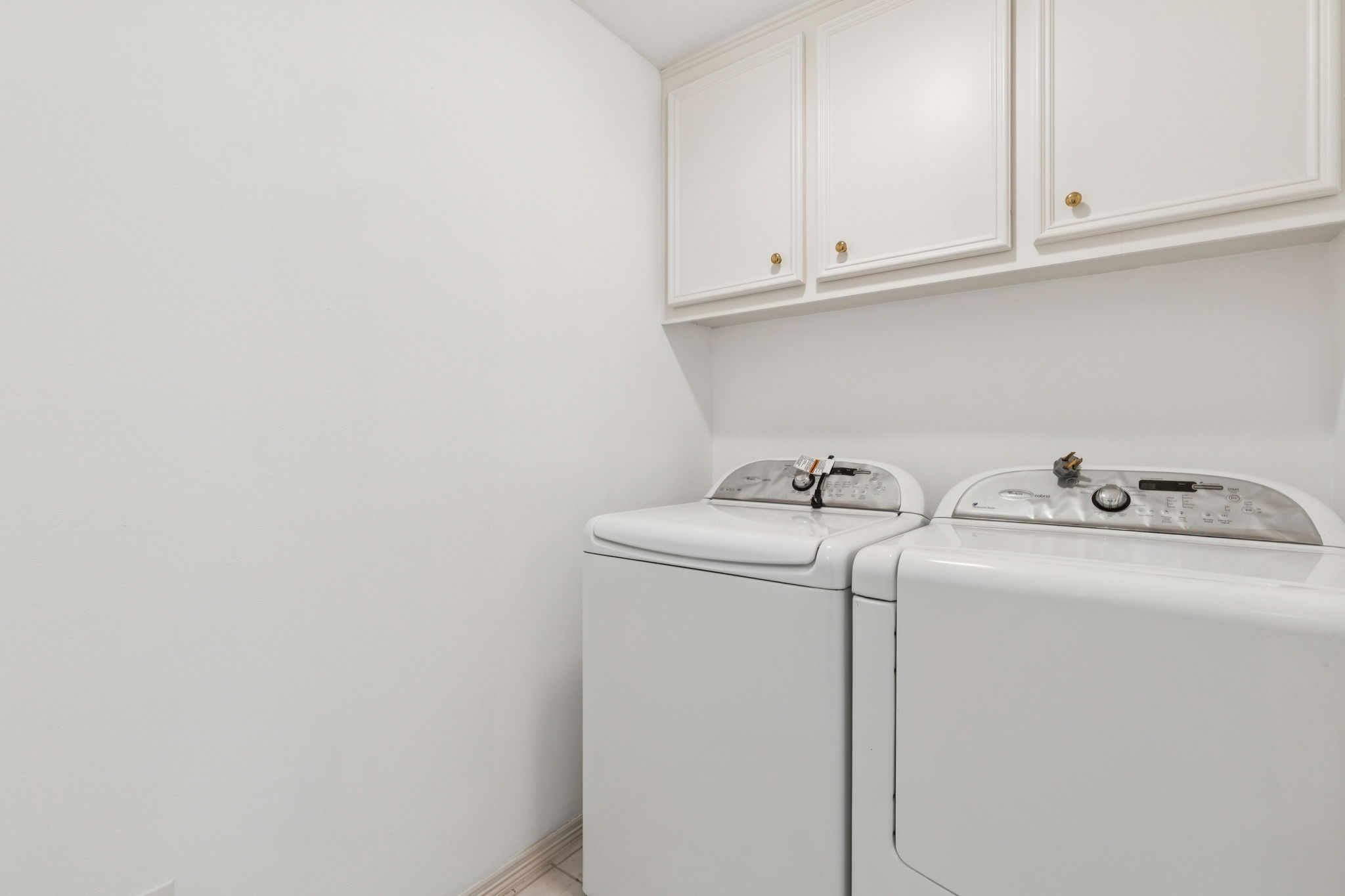 4916 Travis Street Houston, TX 77004 - Photo 22 of 26 Generous size utility room, perfect for all your home's laundry and storage needs.