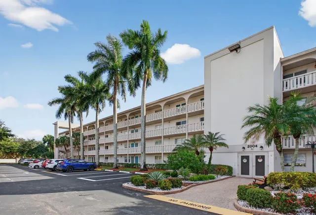 a view of swimming pool and outdoor seating