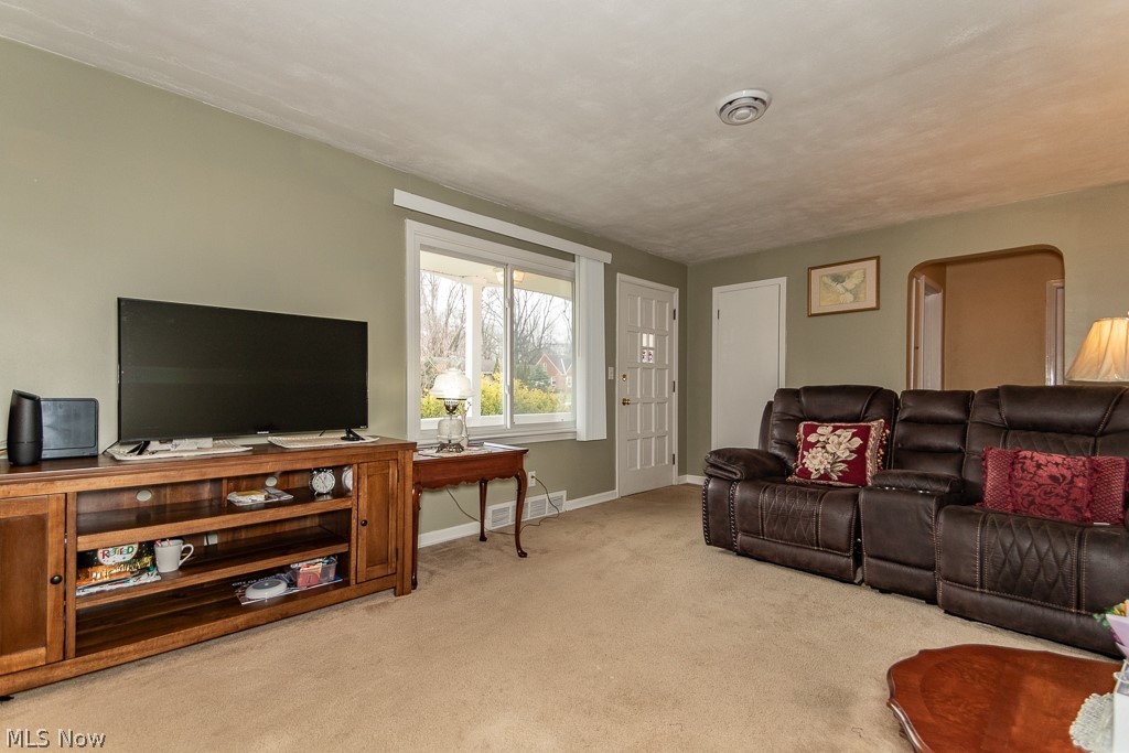 8144 Stockbridge Road Mentor, OH 44060 - Photo 2 of 36 Living room with loads on natural lighting