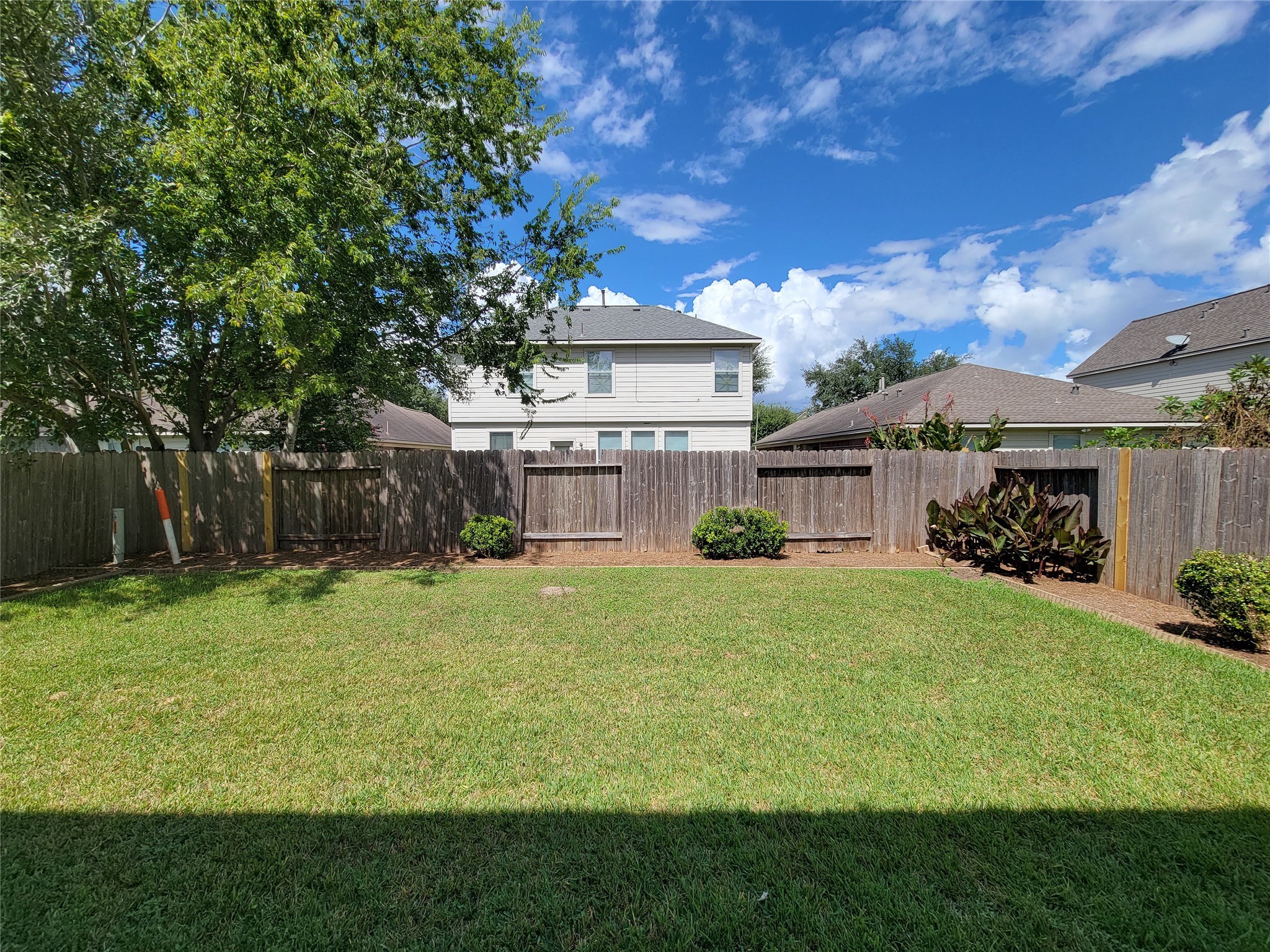 19330 Harvest Stream Way Houston, TX 77084 - Photo 48 of 50 a view of a house with a big yard and large trees